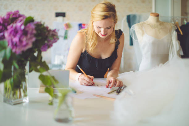 istock Fashion designer is making new sketches 1090912424