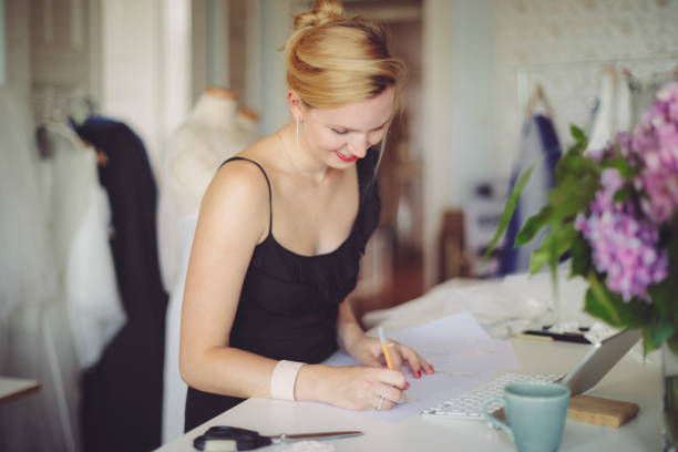istock Fashion designer is making new sketches 1090912442