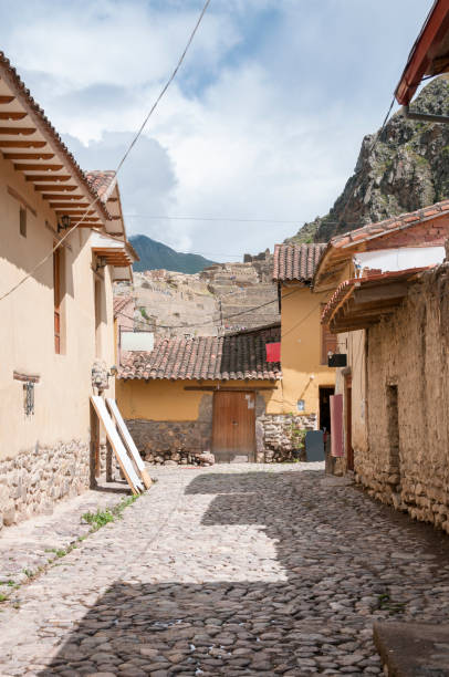 istock Narrow Cobbled Street In Ollantaytambo, Peru (Inca Ruins In The Background) 1090913150