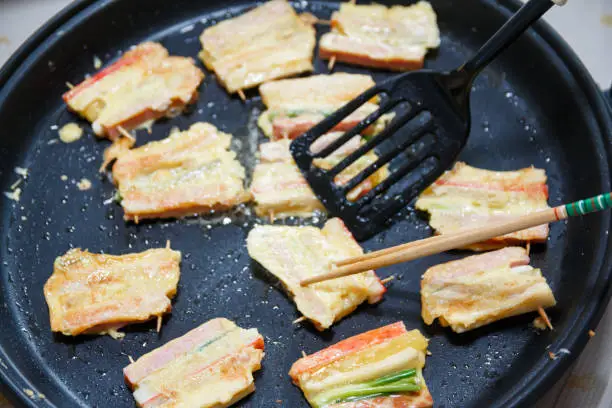 Korean traditional food Sanjeok, made by placing seasoned slices of ingredients on a skewer and grilling or pan-frying them