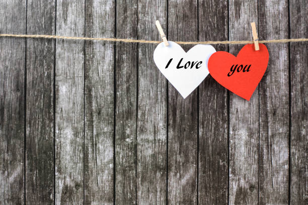 istock Valentine's hearts on a dark wooden background. 1090915420