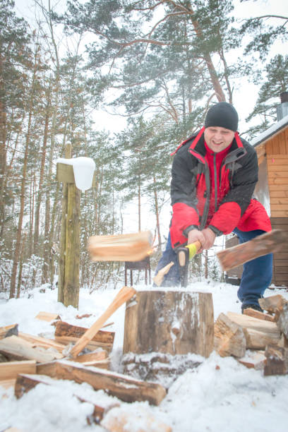 istock Cutting wood in the cold. 1090917814