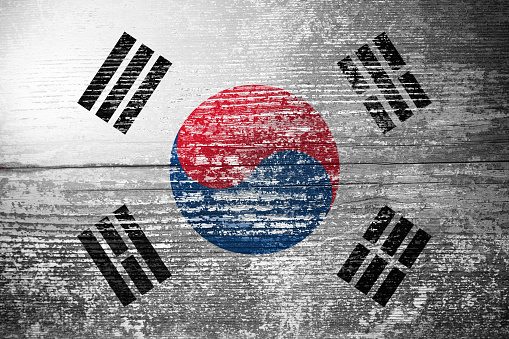 Flag of the United States on Wood Siding with Peeling Paint TextureFlag of South Korea on Wood Siding with Peeling Paint TextureFlag of South Korea on Wood Siding with Peeling Paint Texture