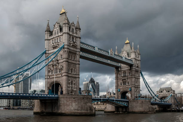 istock Tower bridge, over the river Thames, London, on a cloudy, stormy day 1090929842