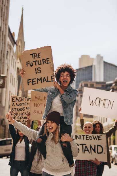 istock Women enjoying during a demonstration on road 1090929972