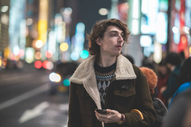 istock Portrait of young man at night 1090931648