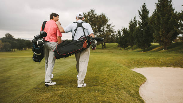 istock Senior golfers walking towards the next hole 1090932822