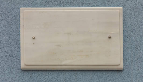istock Blank empty ceramic street sign on a plastered wall, copy space, banner. Mdina, Malta 1090936174