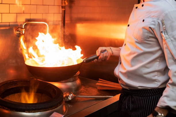 istock A man cooks cooking deep fryers in a kitchen fire. 1090941270