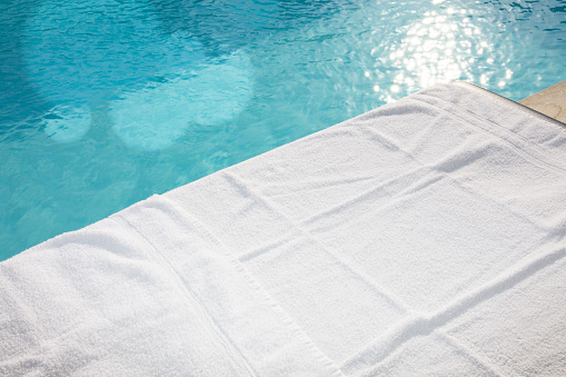towel by the pool ready for massage