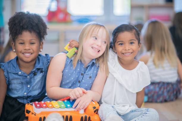 musicales enfants - child group of people multi ethnic group classroom photos et images de collection