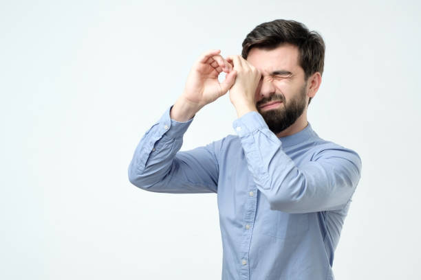 istock Handsome man holding his hands at his eyes as if looking through spy glasses 1090945278
