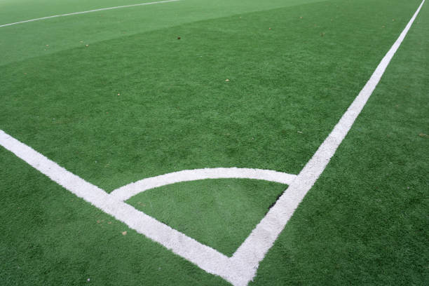 istock football field and blue sky . 1090945400