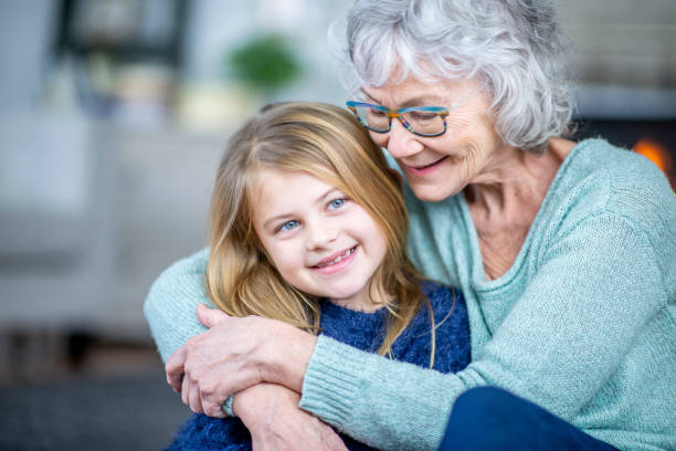 istock Grandma Hugging Girl 1090951956