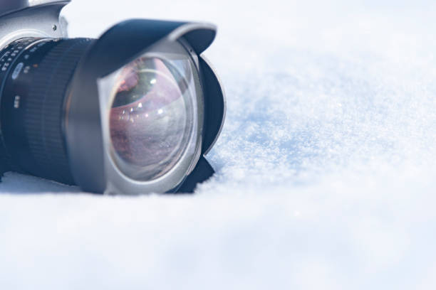 istock camera in the snow, winter photo session 2019 1090952128