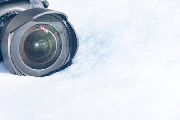 istock camera in the snow, winter photo session 2019 1090952156