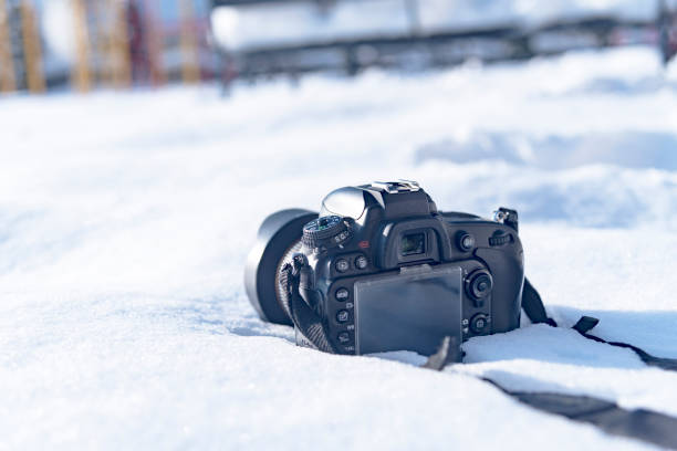 istock camera in the snow, winter photo session 2019 1090952162
