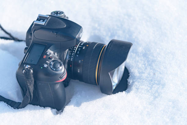 istock camera in the snow, winter photo session 2019 1090952176