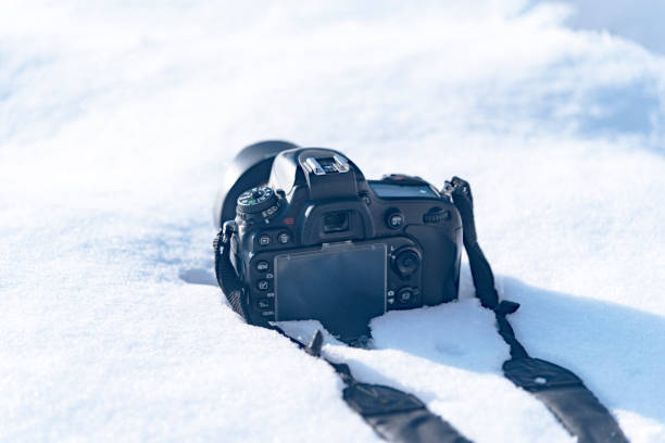 istock camera in the snow, winter photo session 2019 1090952180