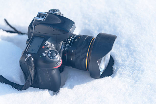 istock camera in the snow, winter photo session 2019 1090952188