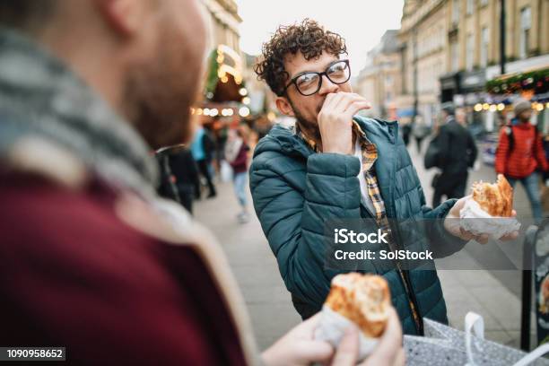 Eating On The Go Stock Photo - Download Image Now - People, Eating, Food