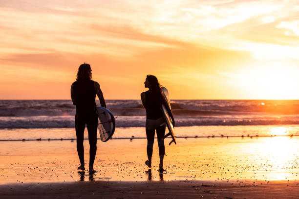 istock Couple surfing in California 1090961736