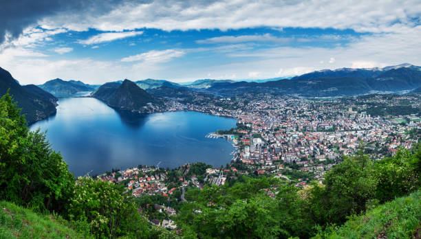 Panoramic sight from Monte Brè Mountain. Lugano, Switzerland, May 12, 2018. Beautiful panoramic view of  Lugano city from Monte Brè Mountain. lugano stock pictures, royalty-free photos & images