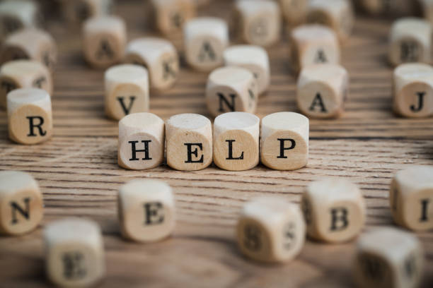dice forming the word HELP dice forming the word HELP emergency shelter photos stock pictures, royalty-free photos & images