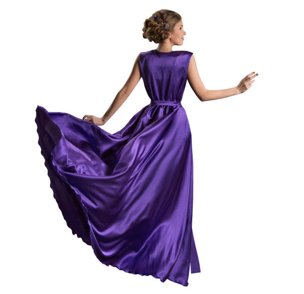 woman purple dress, fashion model in long fluttering gown, back rear view, white isolated - full hair imagens e fotografias de stock