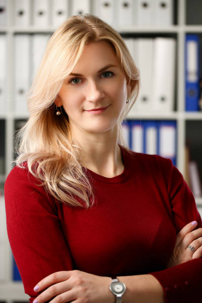 istock Normal blond woman portrait at office 1090977332