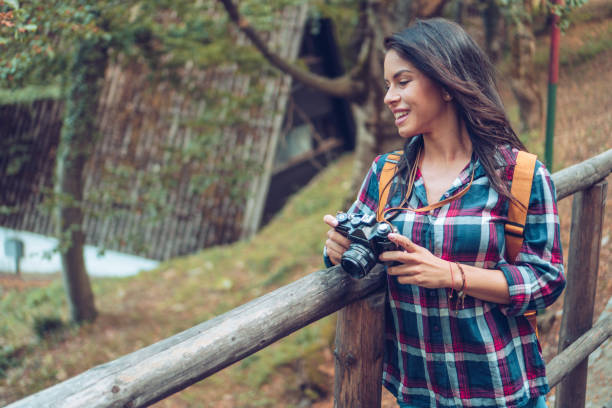 istock Photographer girl in the forest 1090980904