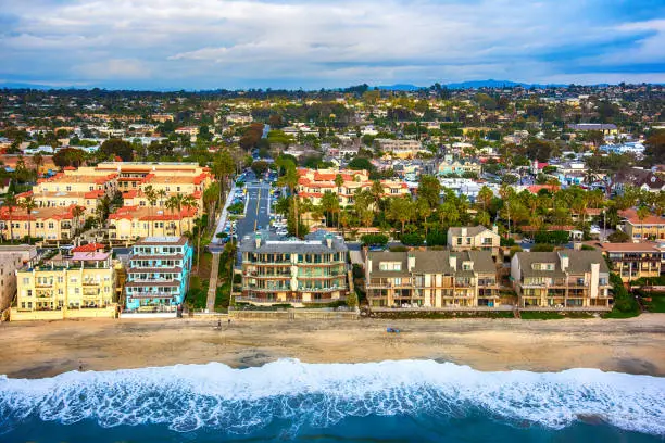 Aerial view of condos lining the beach in the northern San Diego community of Carlsbad, California.