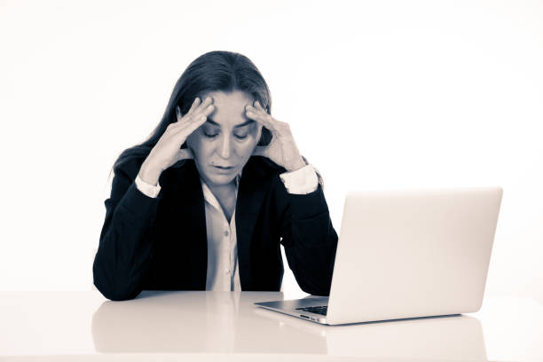 istock Young beautiful business woman suffering stress working at office computer desk feeling frustrated and tired looking overworked overwhelmed In business education failure and technology concept. 1090983820
