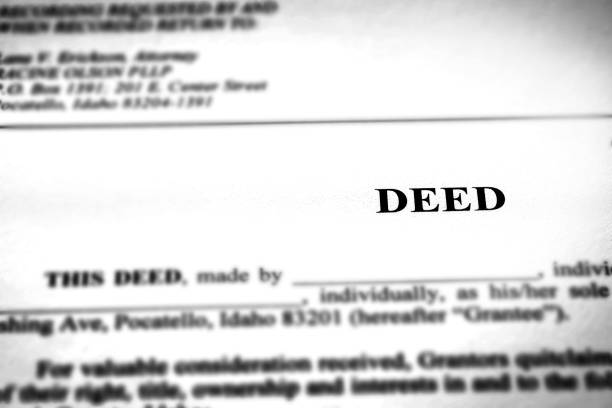 istock Deed to real estate transfer title ownership to land 1090985530