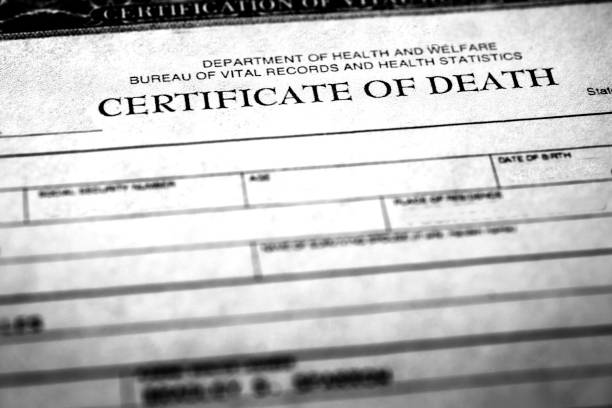 Closeup of a death certificate stock photo