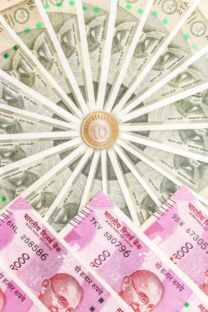istock New indian 500 and 2000 rupees banknotes and  10 rupees coin. 1090986292