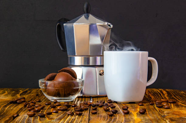 coffee composition - coffee maker, white cup of coffee and dessert - ретро imagens e fotografias de stock