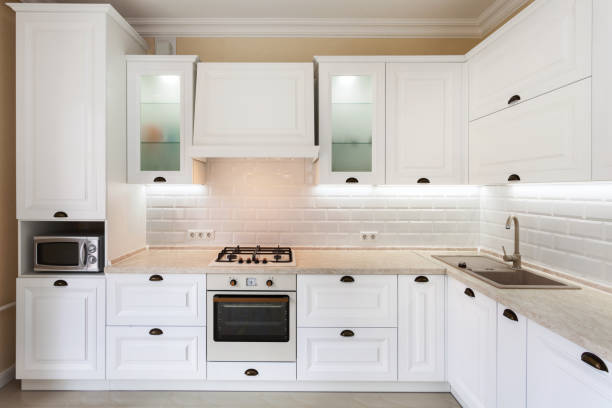 istock Photo of upscale interior with bright light kitchen cabinet and other designer elements 1090990734
