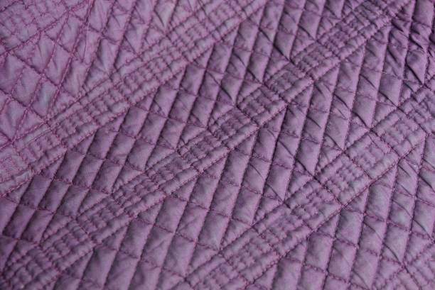 istock lilac texture of synthetic fabrics with a pattern 1090996716