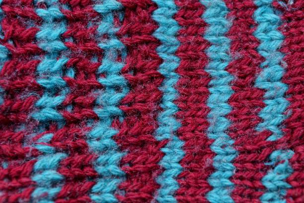 istock red blue striped fabric texture of woolen old clothes 1090997120