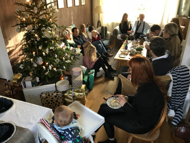 Brunssum, the Netherlands, - December 25,  2018. Happy Family having a party on Christmas Eve.
