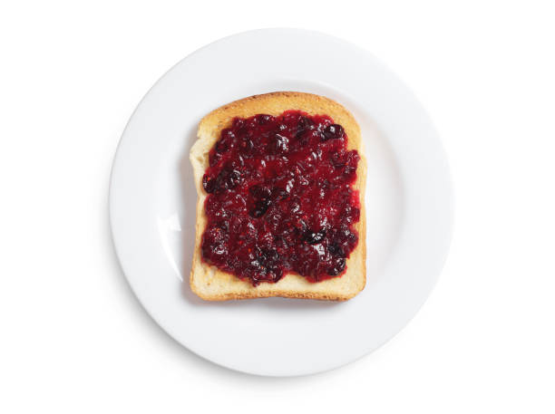 istock Toast with cranberry jam on white plate 1091008926