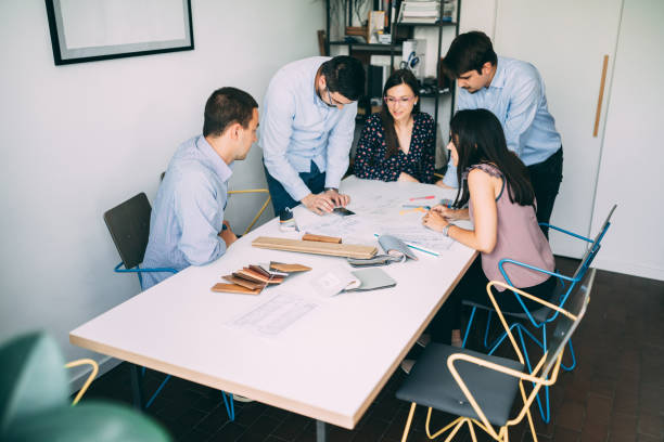 istock Group of young millennials working in the office 1091014162