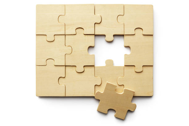 istock Toys: Wooden Jigzaw Puzzle Isolated on White Background 1091017988
