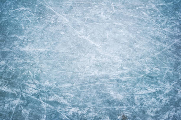 Blue ice in skate scratches stock photo