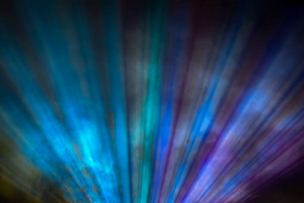 Rainbow color projector light beam stock photo
