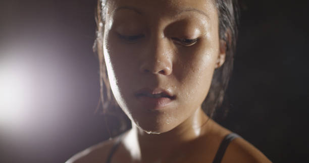 istock Portrait of athletic woman sweating taking a break from workout 1091032642
