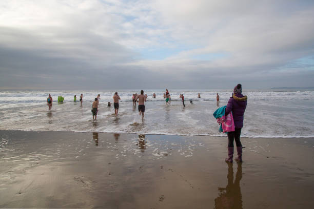 New Year's Day Fancy Dress Swim - Aberavon Aberavon, Wales, UK: January 01, 2019: People swim in the sea during a New Year's Day Polar Swim. Some are in fancy dress and any money raised go to a local charity. 2019 new year resolution stock pictures, royalty-free photos & images