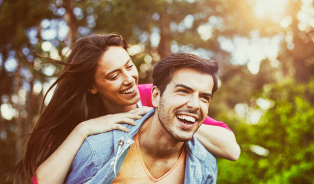 istock Happy romantic couple piggyback 1091048012