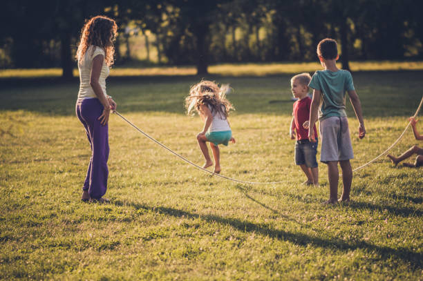 istock Group of children playing in public park 1091049488